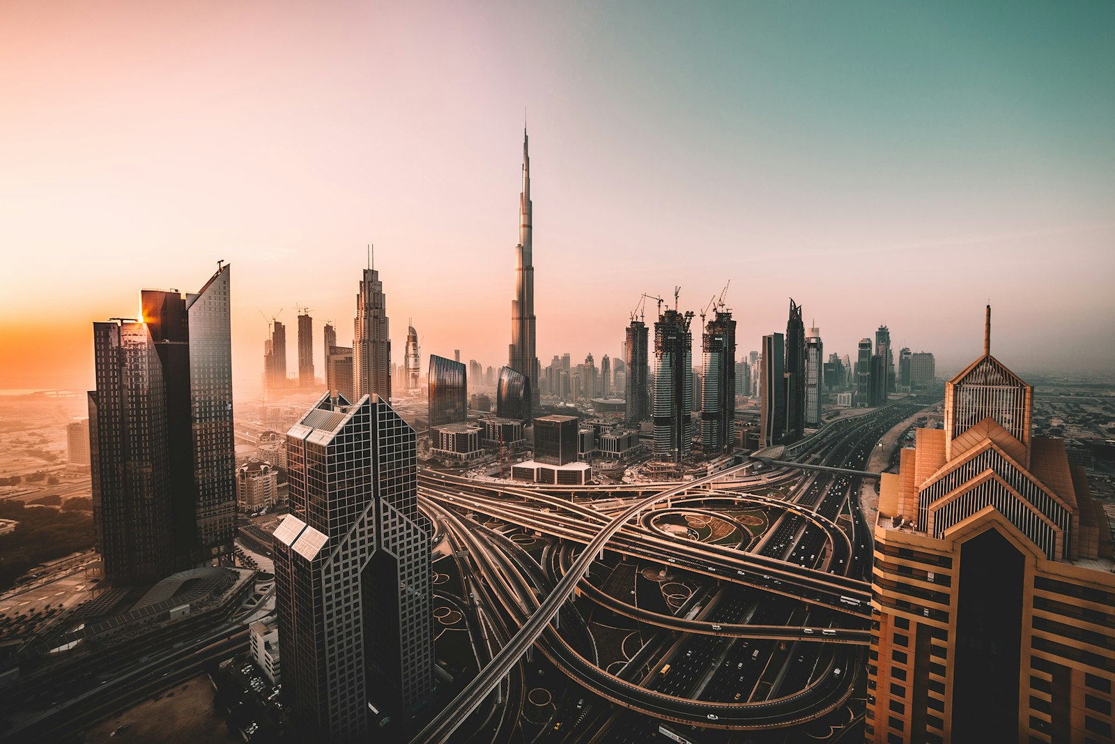 Dubai skyline at dusk, showing the Burj Khalifa and central business district, representing the UAE commercial environment AxisHR serves